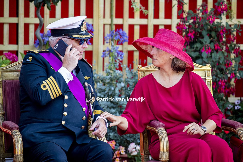 Prince Laurent criticized for taking phone call during the Belgian